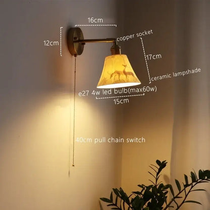 Copper-finished vintage brass ceramic led wall sconce with a ceramic lampshade embossed deer design for bedroom decorbites ceramic led wall
