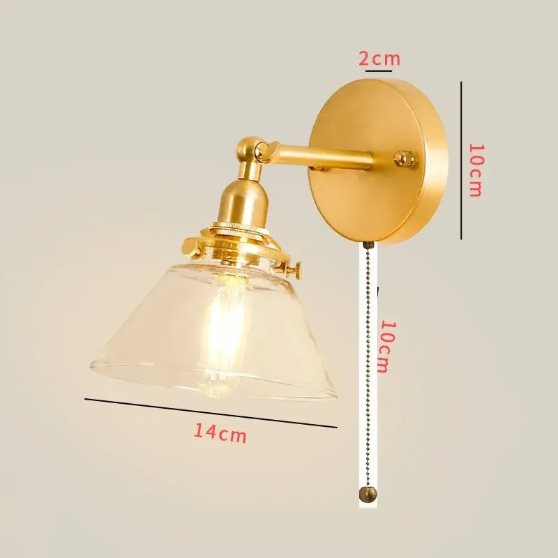 Vintage brass chevron wall lamp with gold-finished brass, clear glass shade, and exposed led filament bulb bedroom sconce