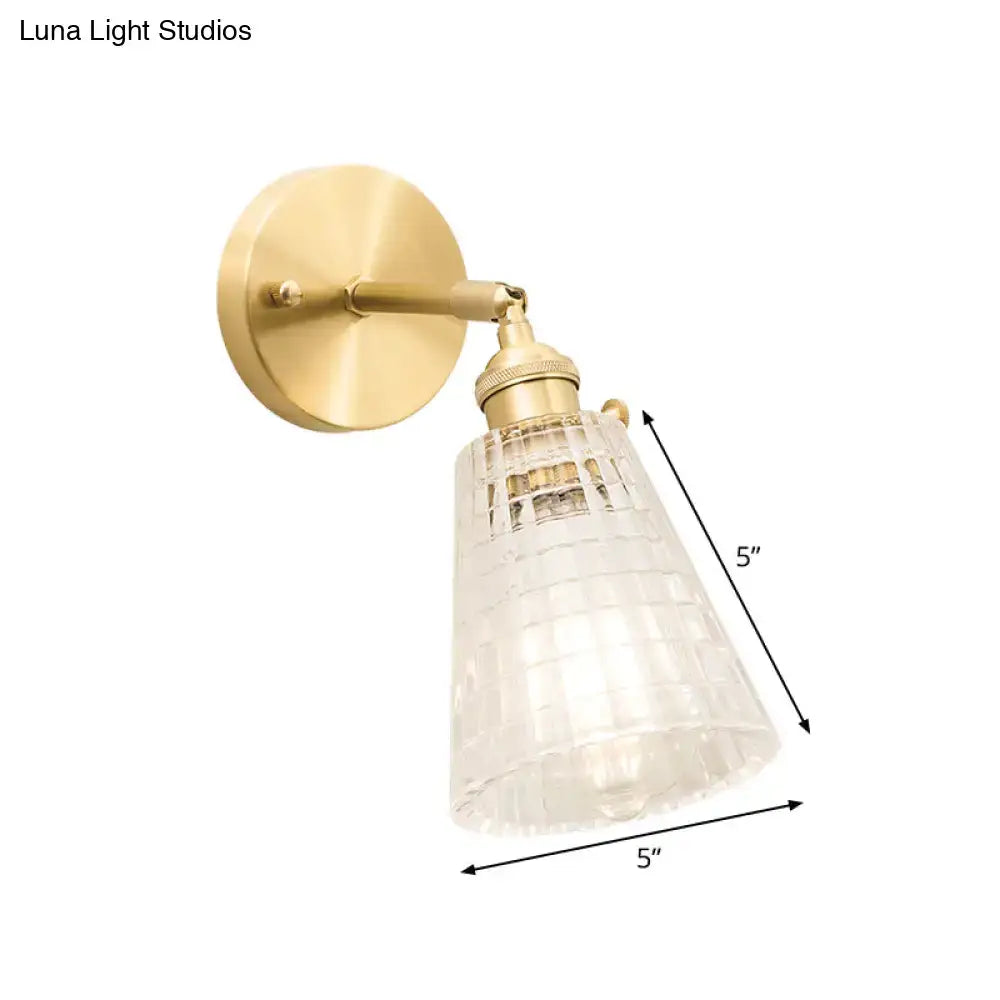 Vintage brass clear ribbed glass wall sconce with intricate grid pattern suitable for led incandescent lighting