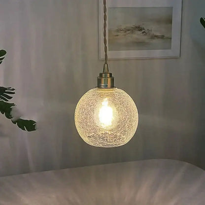 Vintage brass crackled glass globe led pendant light with warm textured glass globe and brass-toned metal fixture