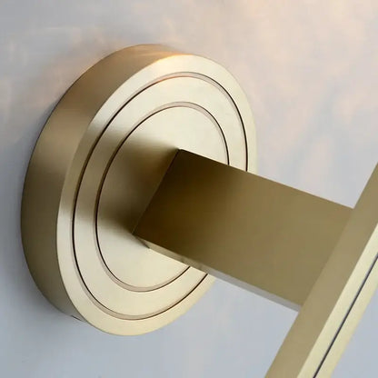 Vintage brass crystal copper wall lamp with circular brass door stop and concentric ring detailing for bedroom decorbites crystal copper wall use