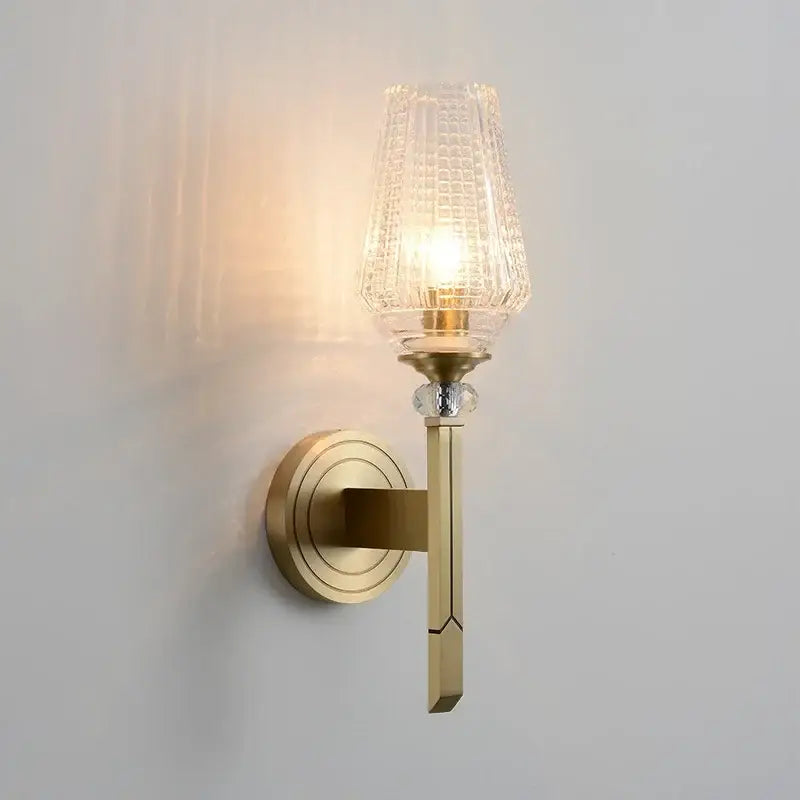 Vintage brass crystal copper wall lamp with faceted glass shade providing warm light for bedroom decorbites wall lamp