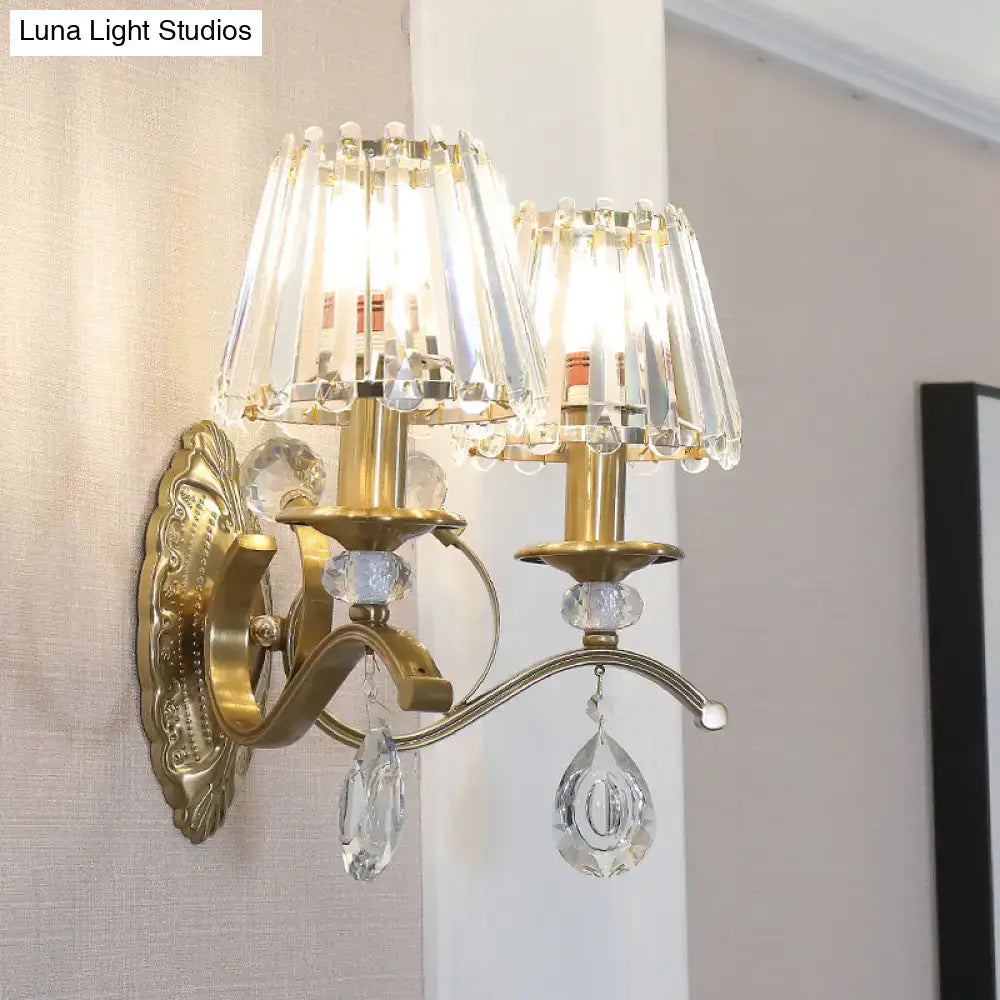 Vintage brass crystal fringe wall sconce with gold-toned fixture, two crystal lampshades, and e14 bulb base light type