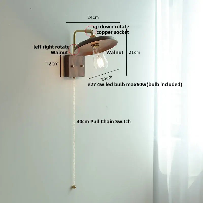 Vintage brass and dark wood wall light sconce with a copper metal arm and exposed Edison bulb by decorbites copper
