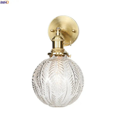 Vintage brass etched glass globe led wall light with clear etched glass and brass-finished mounting bracket for bedroom sconce
