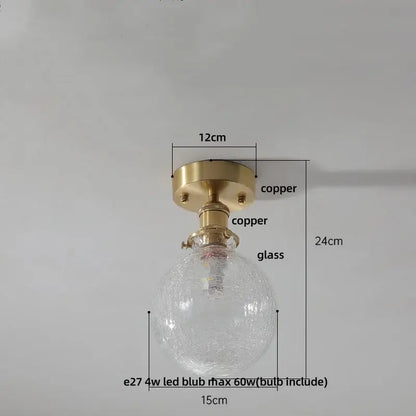 Vintage brass etched glass led ceiling light with clear textured glass globe and copper finish mounting base for living room