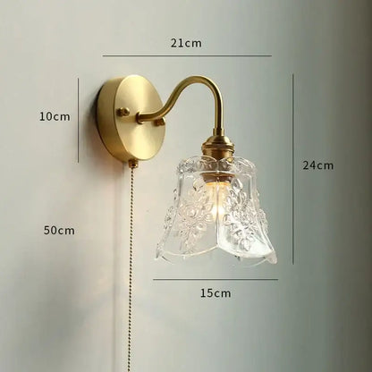 Antique brass wall sconce with clear intricately etched floral glass led shade for glass led bathroom decorbites