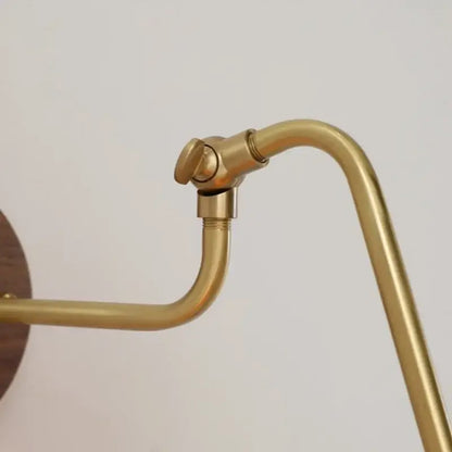 Brass-finished vintage decorbites led wall sconce with curved arm and rotate pull chain for bedroom lighting
