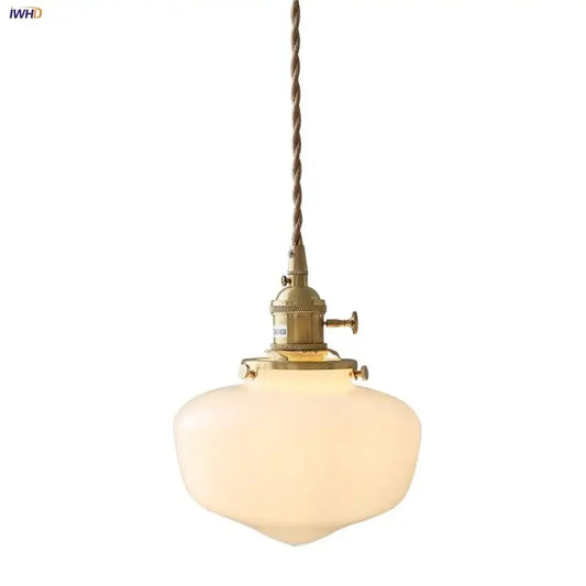 Vintage brass pendant light with frosted glass led pendant shade and twisted cord suspension for kitchen use