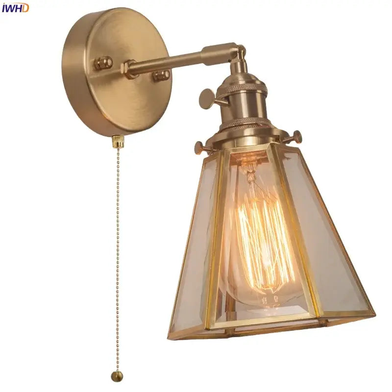 Antique brass-finished wall light with clear glass shade and exposed Edison bulb vintage decorbites brass glass led sconce
