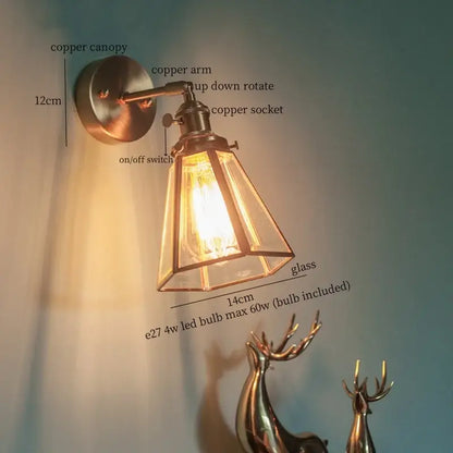 Vintage brass glass led wall light featuring a copper sconce with clear glass shade and exposed edison bulb decorbites brass glass