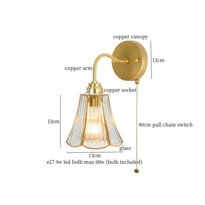 Vintage brass glass led wall light featuring a brass-finished copper canopy and fluted glass shade for bathroom decorbites