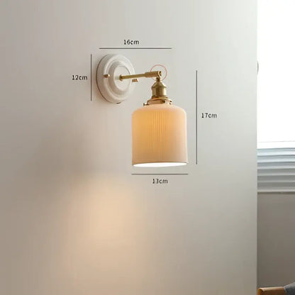 Vintage brass globe wall sconce with a brass-finished arm and off-white ribbed glass shade for bedroom decorbites copper arm led lighting