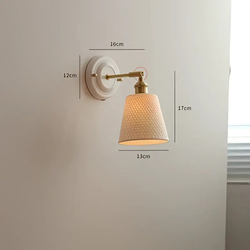 White textured ceramic wall sconce with brass-finished copper arm and ribbed glass shade for vintage bedroom decorbites copper arm led lighting