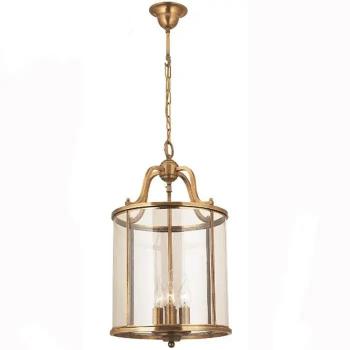 Vintage brass pendant light with clear glass panels and chain suspension helps create ambiance with led bulbs