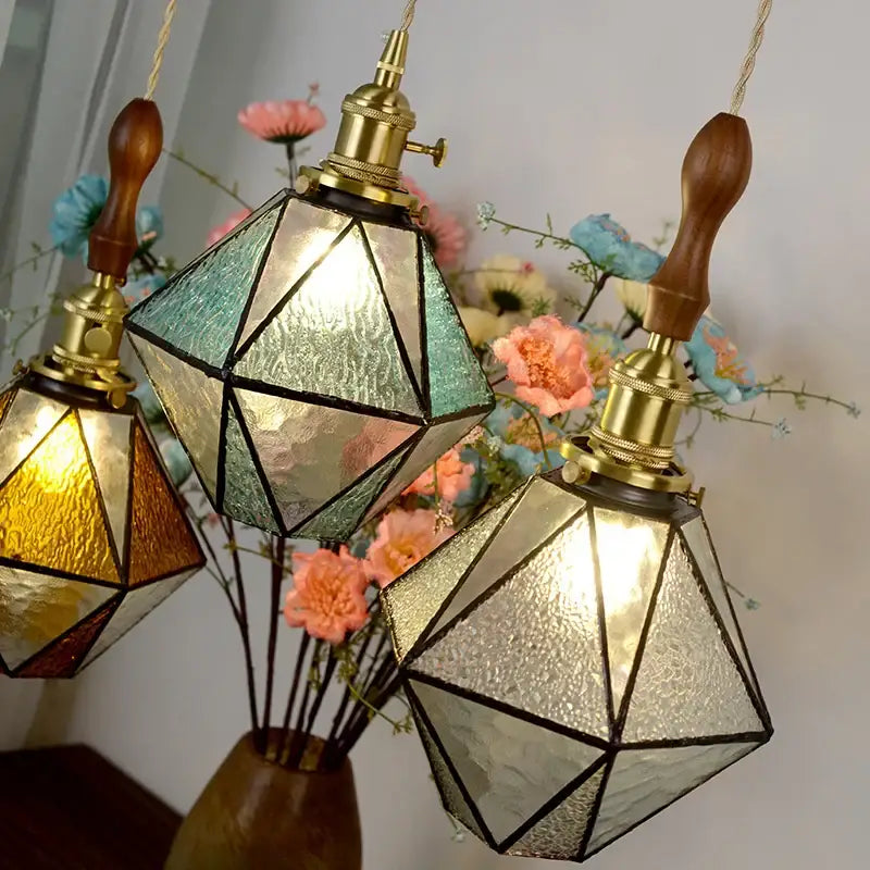 Geometric stained glass pendant light with brass vintage led fittings and wooden handles in amber and teal decorbites brass vintage design