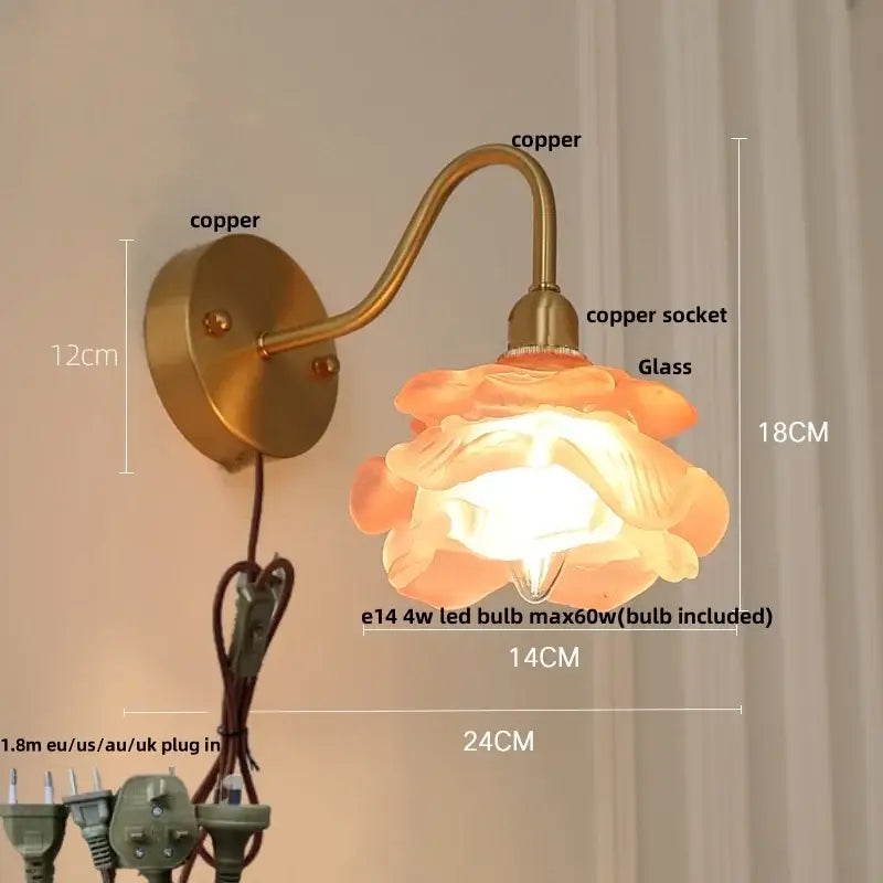Vintage brass led wall light with warm-toned flower-shaped fluted glass shade and copper-finished arm for bedroom decorbites brass led wall