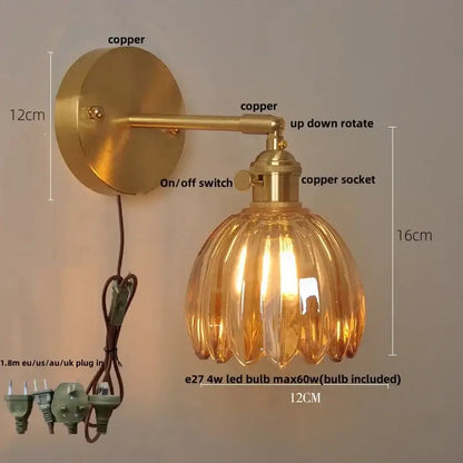 Brass-finished wall light with loft amber glass shade and adjustable arm for vintage bedroom decorbites loft amber style