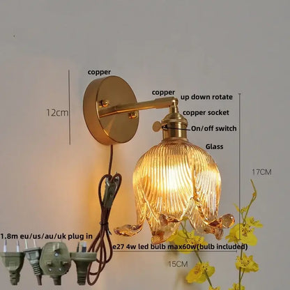 Gold-toned copper wall light with ribbed amber loft amber glass shade shaped like an open flower for bedroom decorbites loft amber