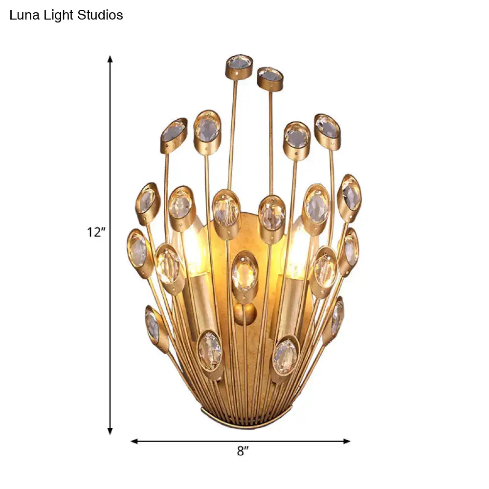 Vintage brass peacock tail design wall sconce with gold-toned finish and clear crystal accents for bedroom lighting