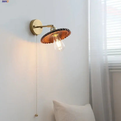 Vintage brass scalloped amber glass wall lamp with exposed edison bulb light fixture for bedroom lighting