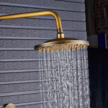 Vintage brass shower faucet mixer set featuring a round rainfall shower head with multiple water jets in brass finish