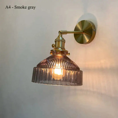 Vintage brass wall lamp with ribbed smoke gray glass shade led diffuser for warm living room lighting