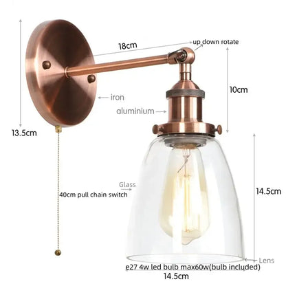 Copper-finished vintage brass wall light fixture with glass dome and exposed Edison bulb for bedroom use
