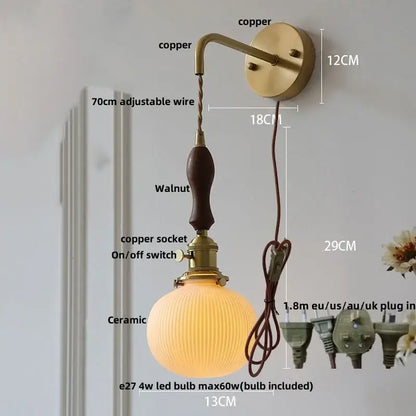 Vintage brass wall light with copper sconce, walnut handle, ceramic globe shade, adjustable wire, and decorbites ceramic knob switch