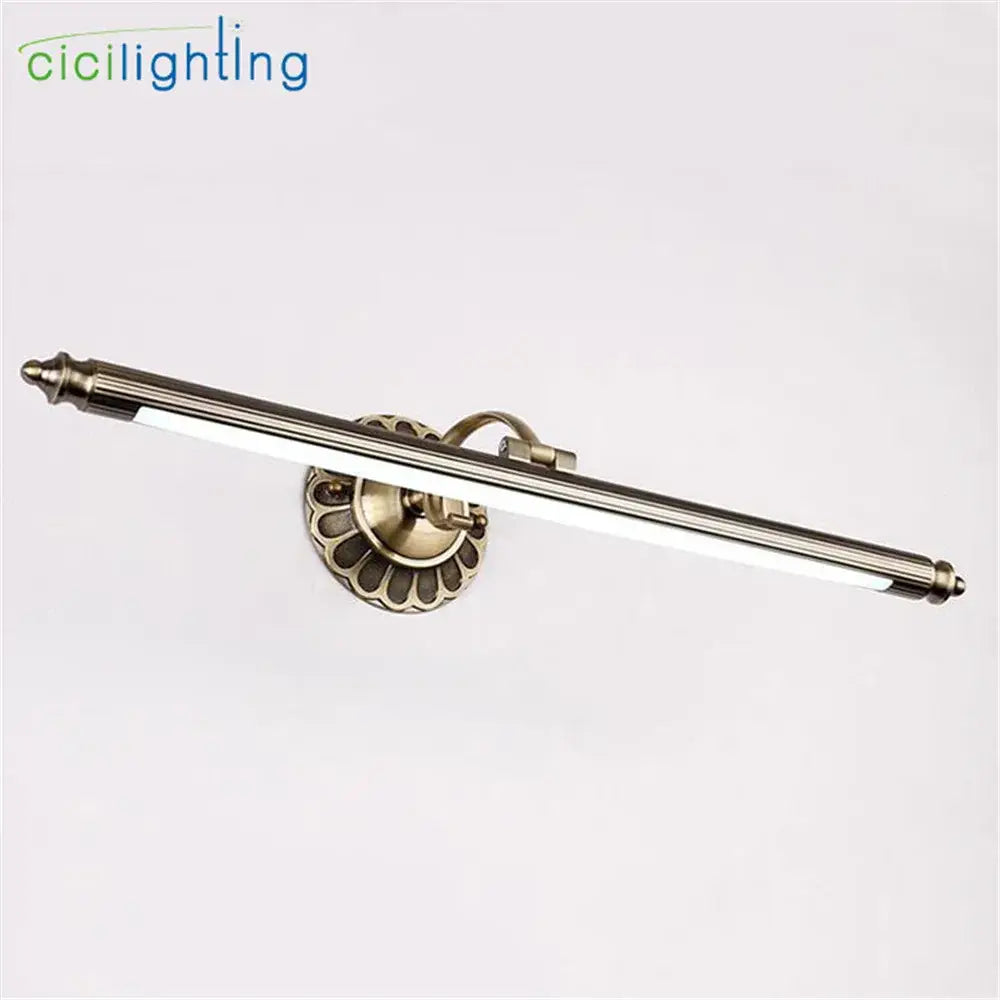 Antique brass-finished wall lamp with decorative scalloped base and fluted mounting plate from decorbites bronze led bathroom collection