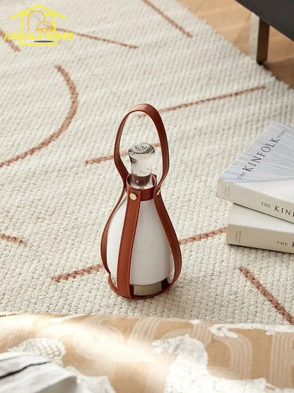 Vintage brown leather grapefruit table lamp with white ceramic body and metallic base for decorbites grapefruit table