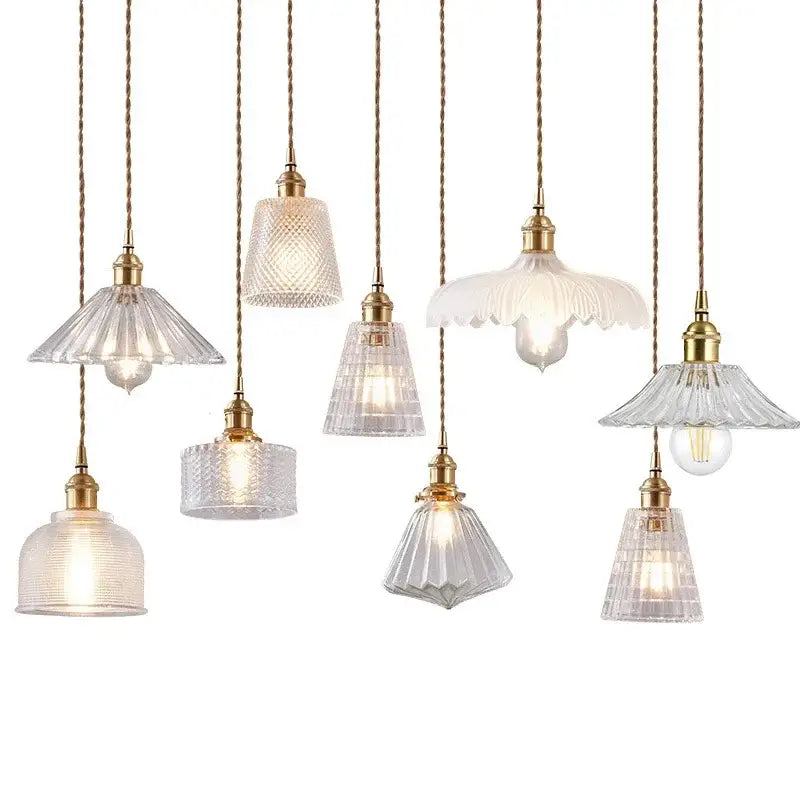 Vintage brown and polished chrome glass pendant light with brass finish and intricate faceted shades for dining room