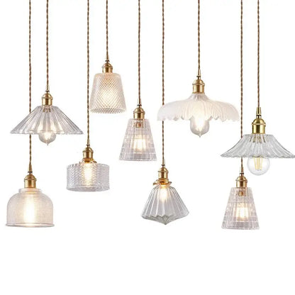 Vintage brown and polished chrome glass pendant light with brass finish and intricate faceted shades for dining room