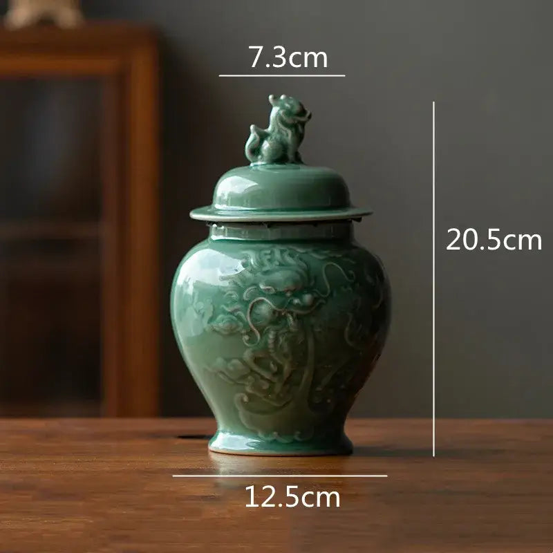 Vintage celadon green ceramic tea caddy with dragon relief and lion figurine lid for kitchen storage jar use