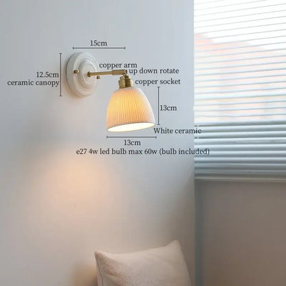 Vintage white ceramic and brass wall sconce light with copper adjustable arm and pull chain for bedroom use