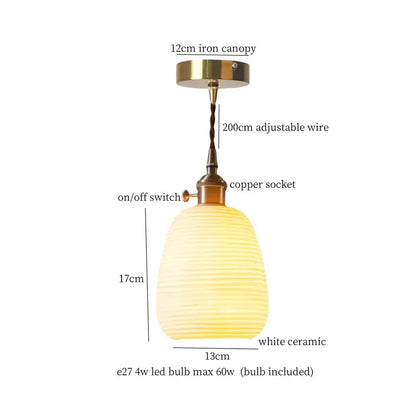 A warm white ceramic led pendant light with ribbed texture and brass finish for kitchen decorbites ceramic led pendant