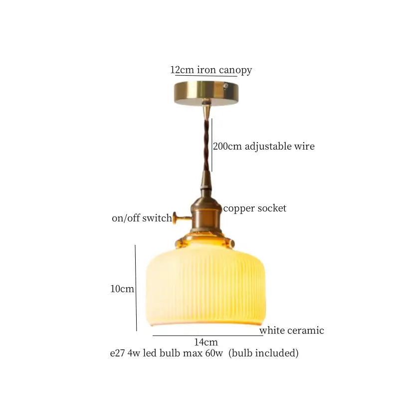 A warm white ceramic led pendant light with ribbed texture and brass finish for kitchen decorbites ceramic led pendant