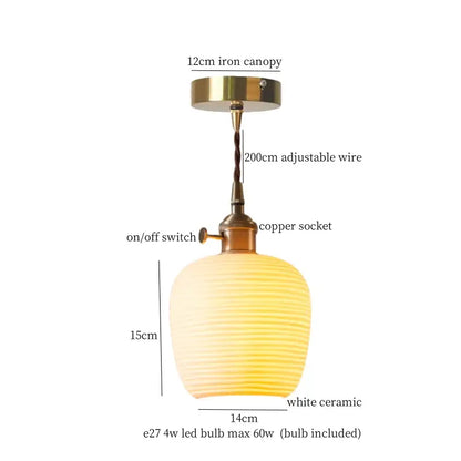 Warm softly glowing white ceramic led pendant light with ribbed texture and brass finish for kitchen decorbites ceramic led