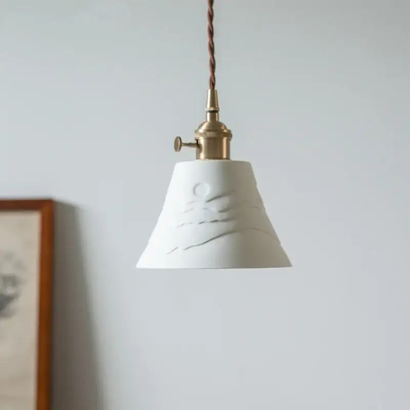 White ceramic led pendant light with textured hand-carved mountain design and brass hardware for kitchen decorbites ceramic led