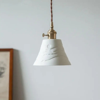 White ceramic led pendant light with textured hand-carved mountain design and brass hardware for kitchen decorbites ceramic led