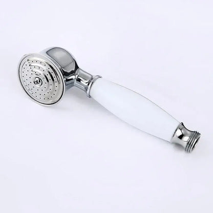 Vintage chrome and white ceramic shower hand holder with chrome finished showerhead and perforated spray face