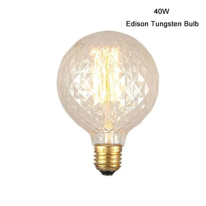 A vintage clear faceted led globe edison bulb with a brass screw base dimmable 4w led for living room lighting