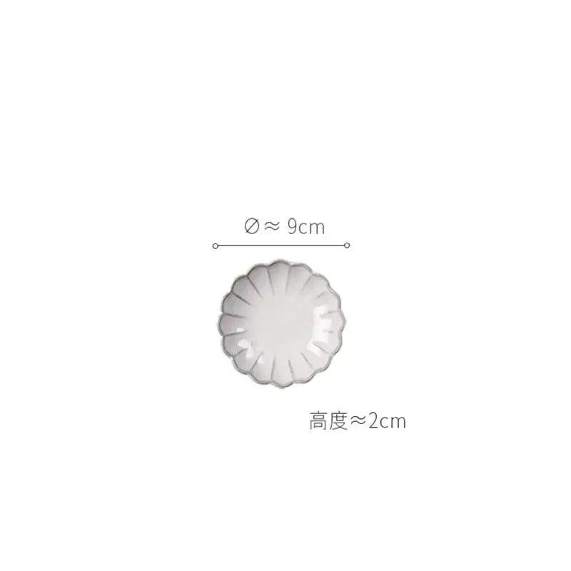 Delicate vintage cream scalloped white ceramic dish with glossy finish from dining table set for elegant dining table use