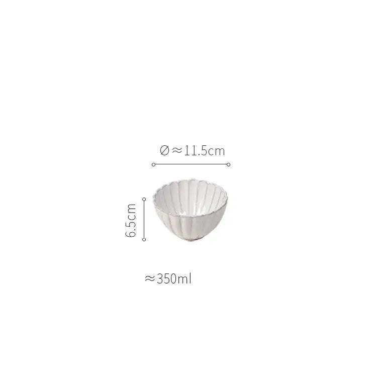 White ceramic bowl with fluted scalloped rim from vintage cream scalloped ceramic dining table set for dining table use