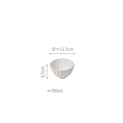 White ceramic bowl with fluted scalloped rim from vintage cream scalloped ceramic dining table set for dining table use