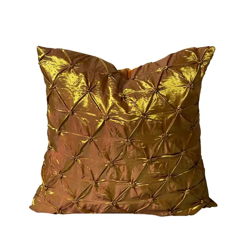 A shimmering gold satin cushion cover with quilted diamond pattern paired with vintage dark brown black fox fur decorbites fox fur