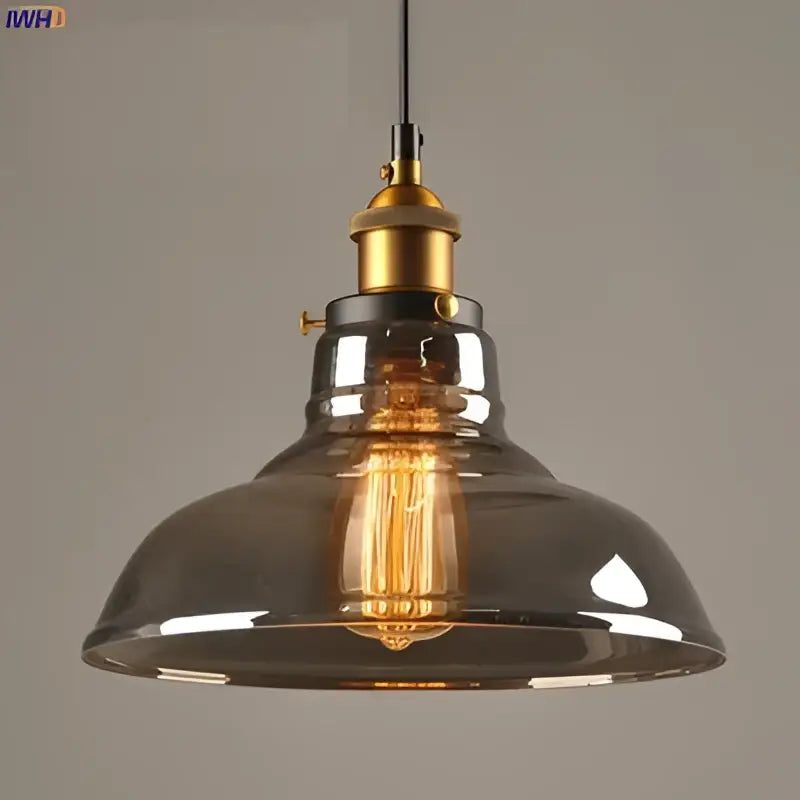 Vintage dark glass pendant lights set of 4 with smoked glass shades brass accents and exposed edison bulbs for dining rooms