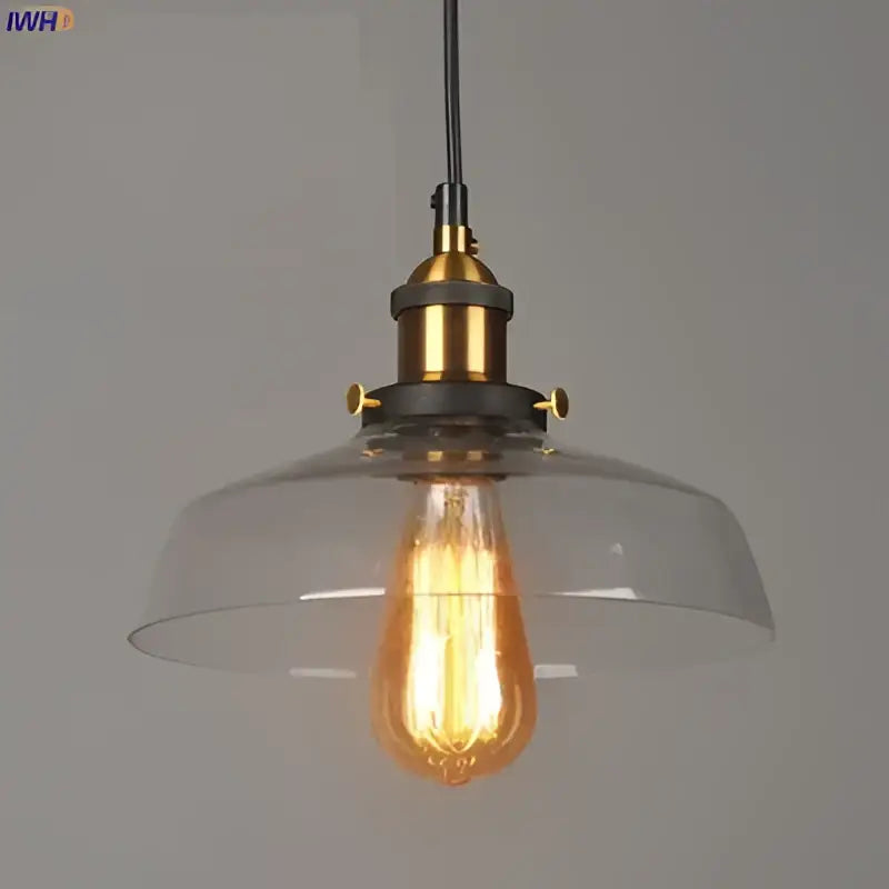 Vintage dark glass pendant lights set of 4 with brass accents featuring clear glass pendant and exposed edison bulbs