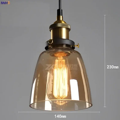 Vintage dark glass pendant lights set of 4 with amber glass pendant shades and brass accents for dining room lighting
