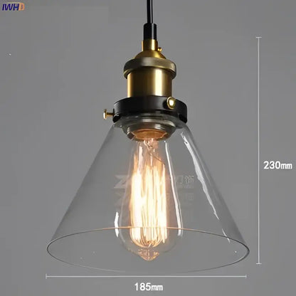 Vintage dark glass pendant lights set of 4 with clear glass pendant shades brass accents and exposed edison bulbs for dining room